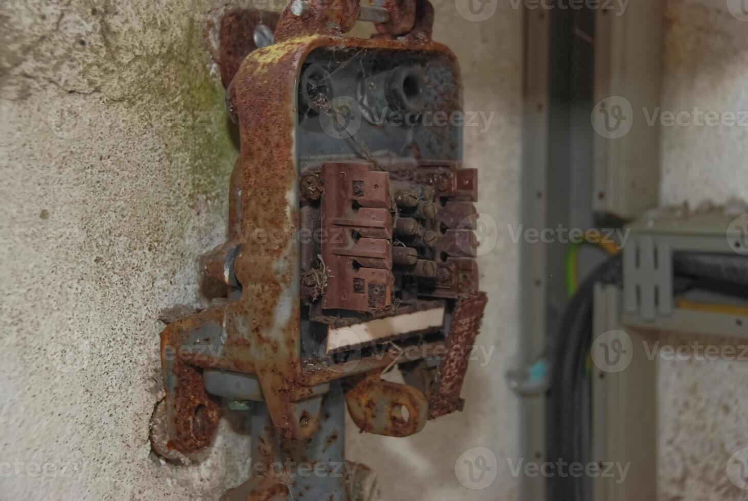 Rusty Electrical Panel on Wall photo
