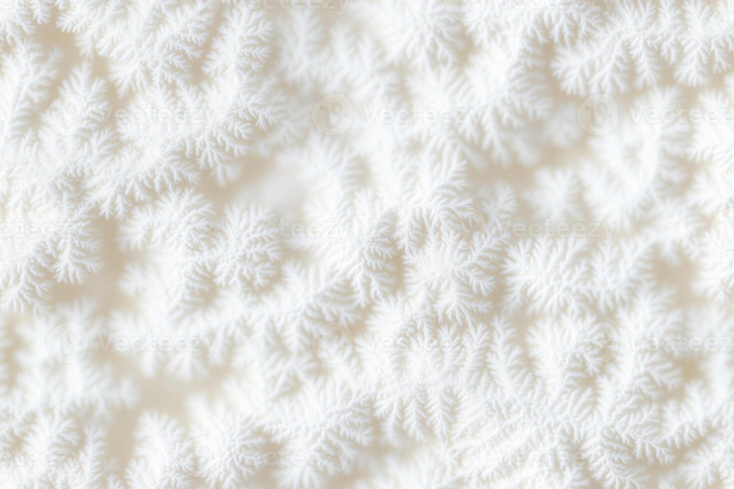 A close up of a white snowflake pattern photo