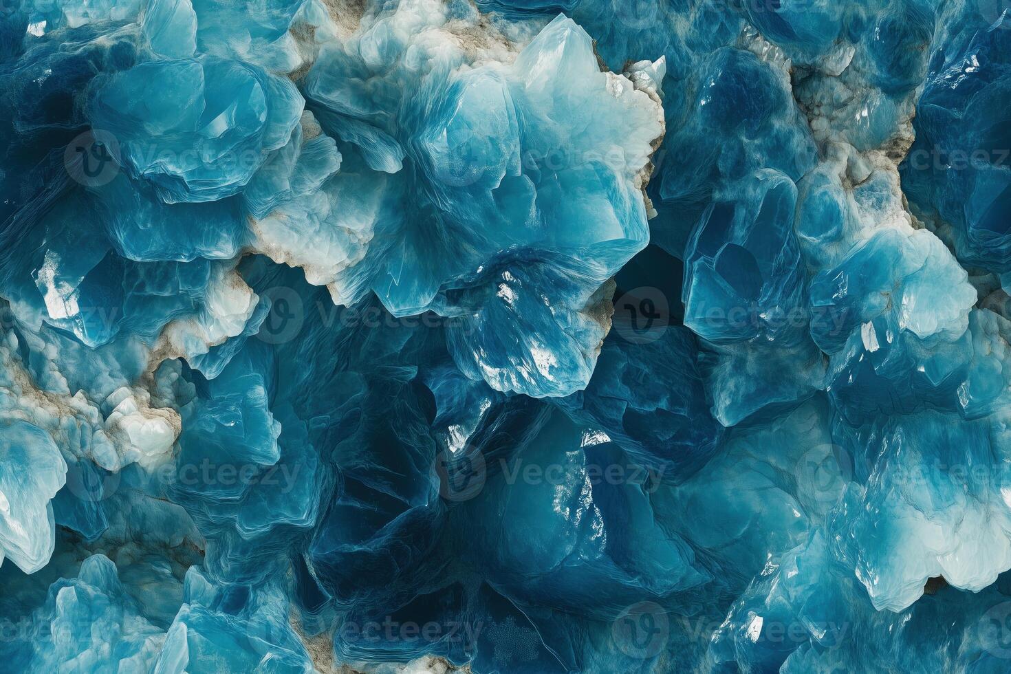 Blue crystals on a rock wall photo