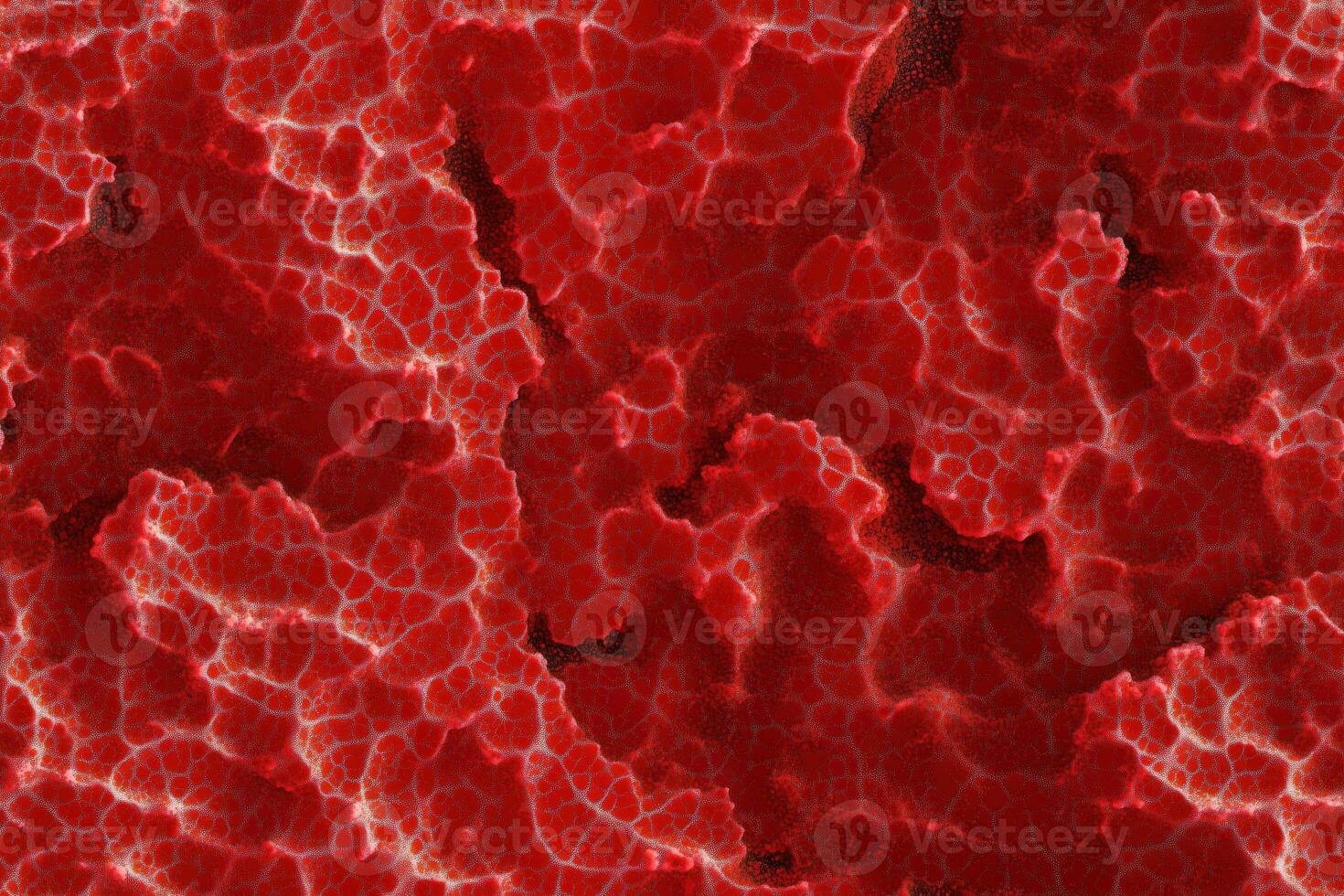 A close up of a red surface with many small holes photo