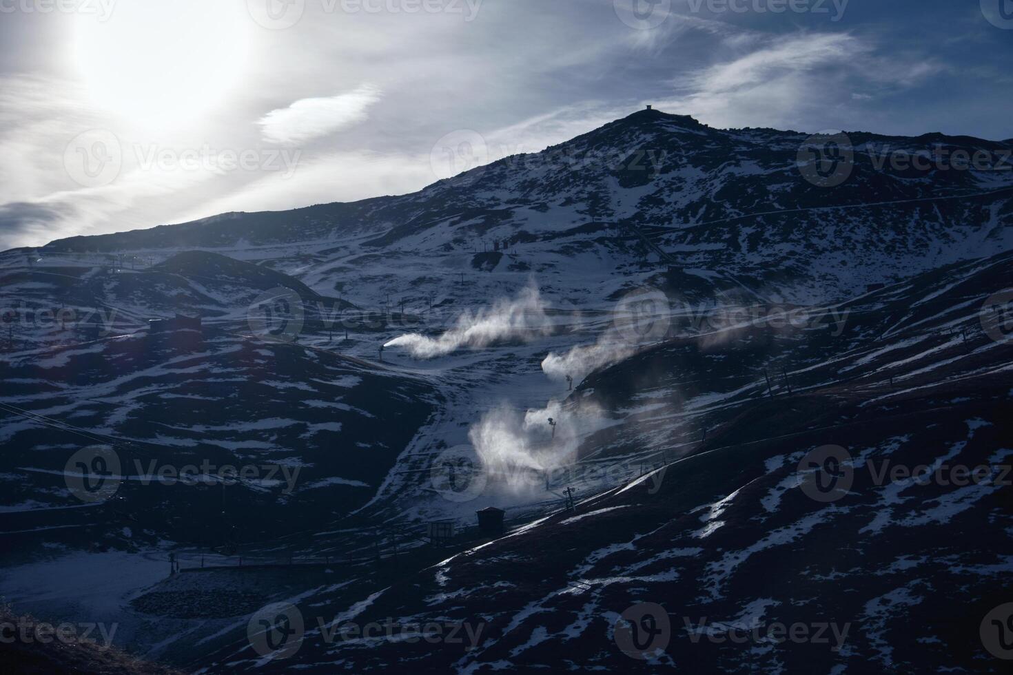 Ski resort on mountain slope in morning photo
