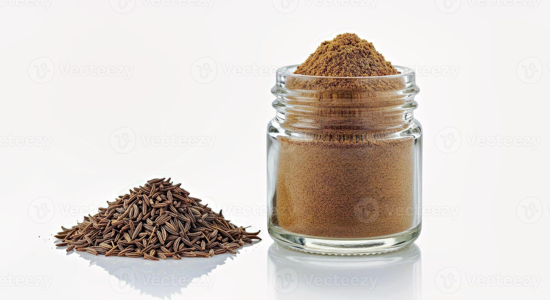 Cinnamon powder and cumin seeds photo
