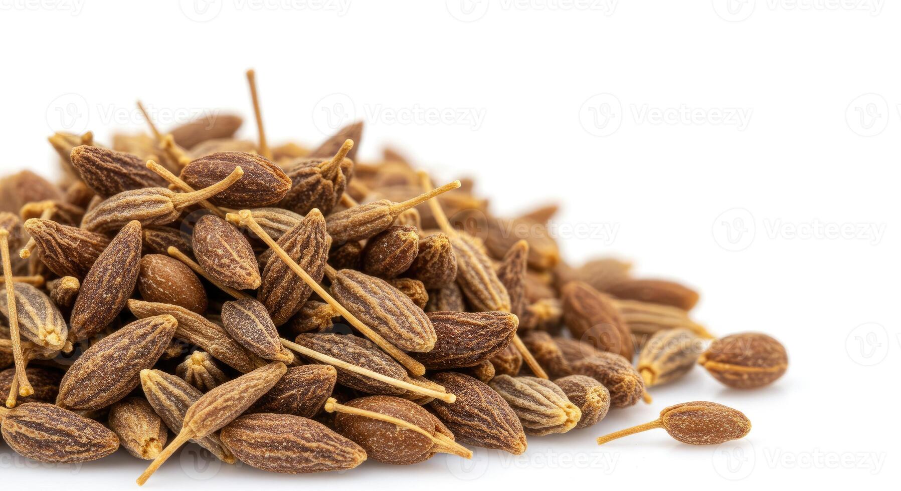 A pile of cardamom seeds on a white background photo