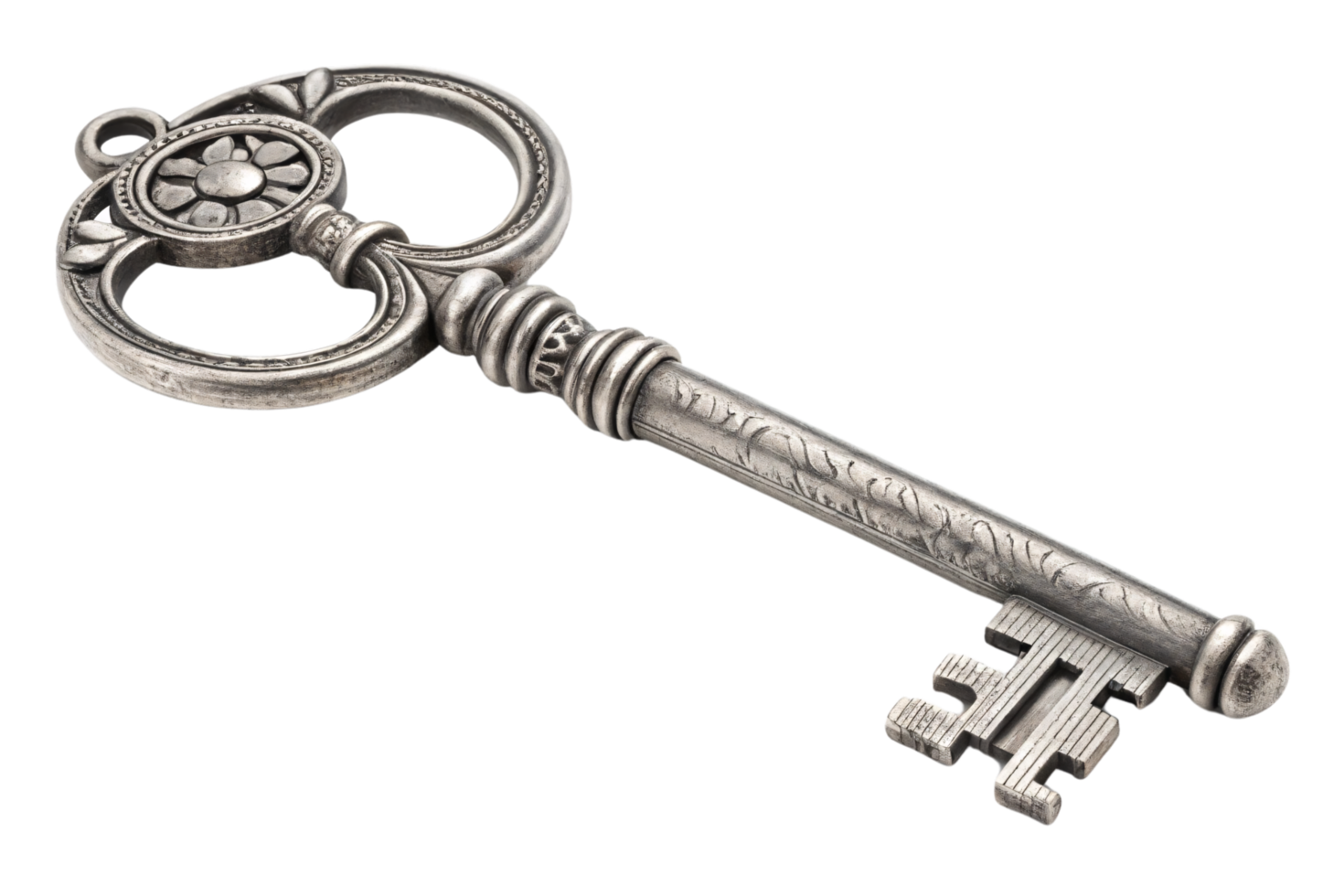 An ornate silver skeleton key featuring an engraved floral design on its head and intricate patterns along its slender, antique shaft png