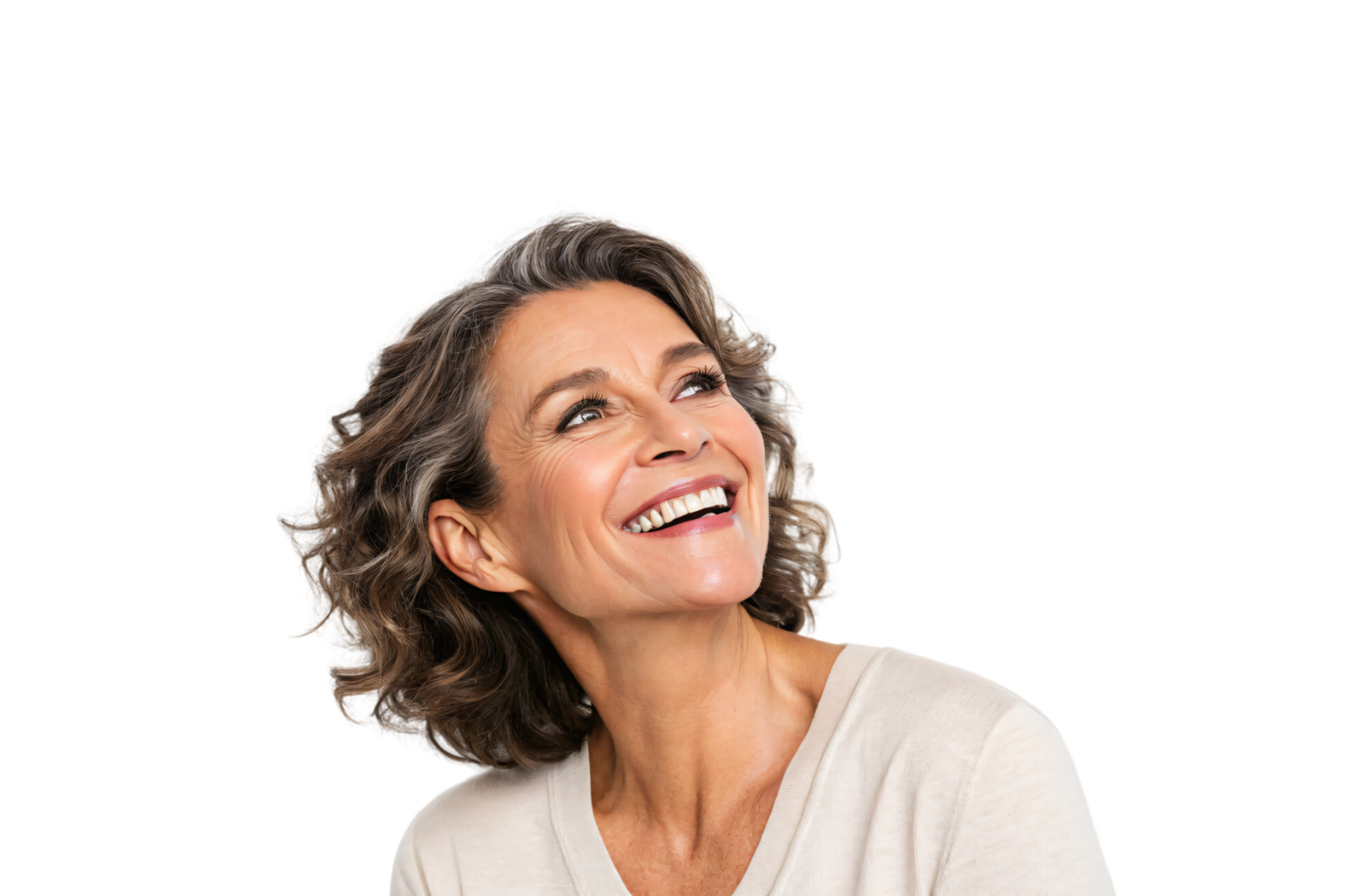 A cheerful woman with curly hair and a beige top laughs heartily, her joyful expression capturing a moment of genuine happiness and light png