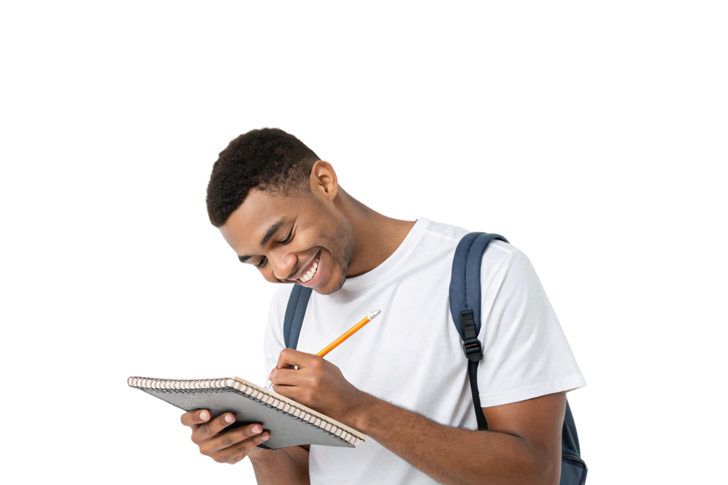 A student in a white t-shirt and backpack smiles warmly, engrossed in writing in a spiral notebook, showcasing youthful energy and enthusiasm png