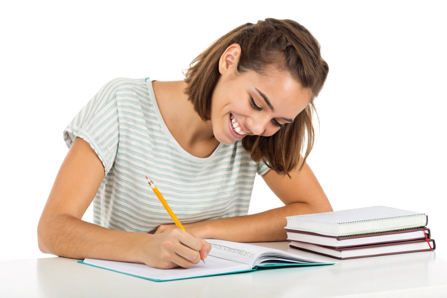 A young woman with short brown hair, wearing a striped shirt, sits at a desk and smiles while writing in a notebook surrounded by books png
