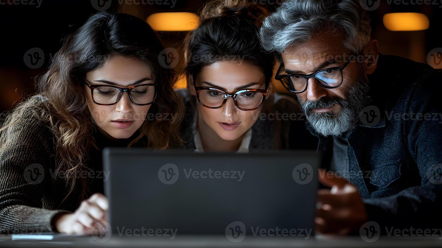 Asian business executive sharing screen from laptop, colleagues focused in a well-lit office photo