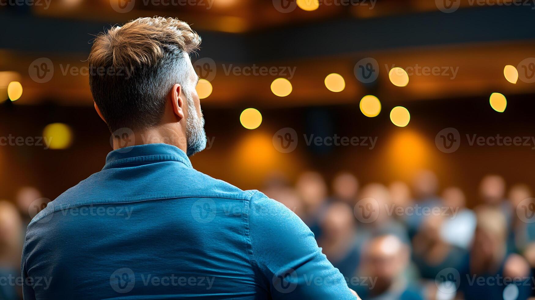 A professional in casual attire presenting at relaxed startup event photo