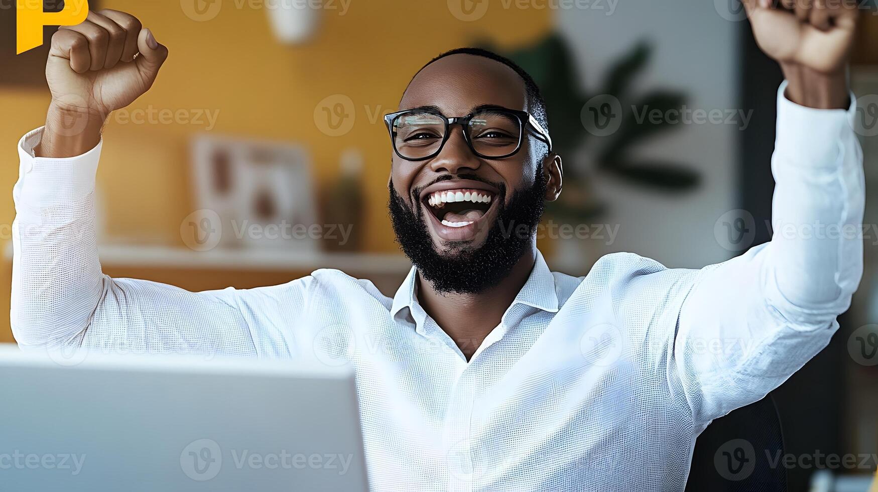 A group of coworkers celebrating project success in a brightly lit office space. photo