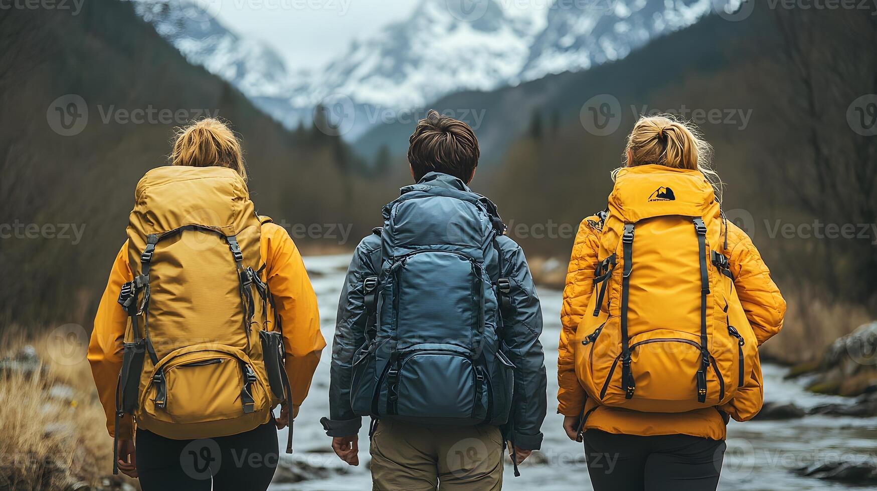 Friends exploring hiking trails together with backpacks and water bottles. photo