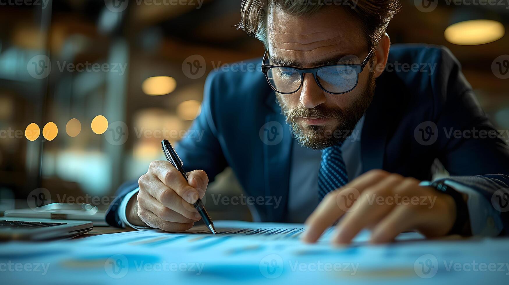 High-resolution scene of business analyst reviewing metrics with charts softly blurred photo