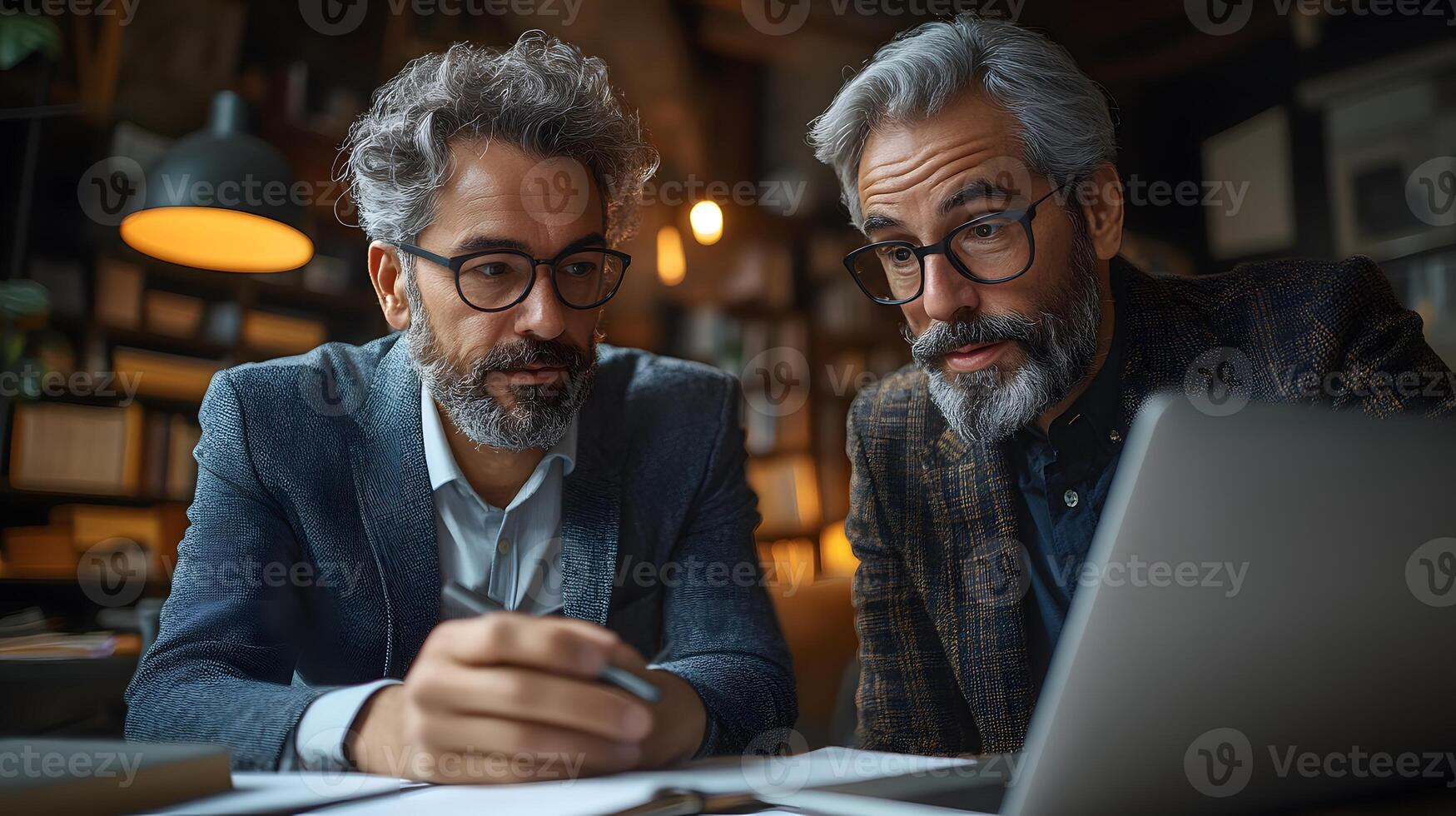 CEO and manager analyzing data on laptop engaging conversation in professional office, photo