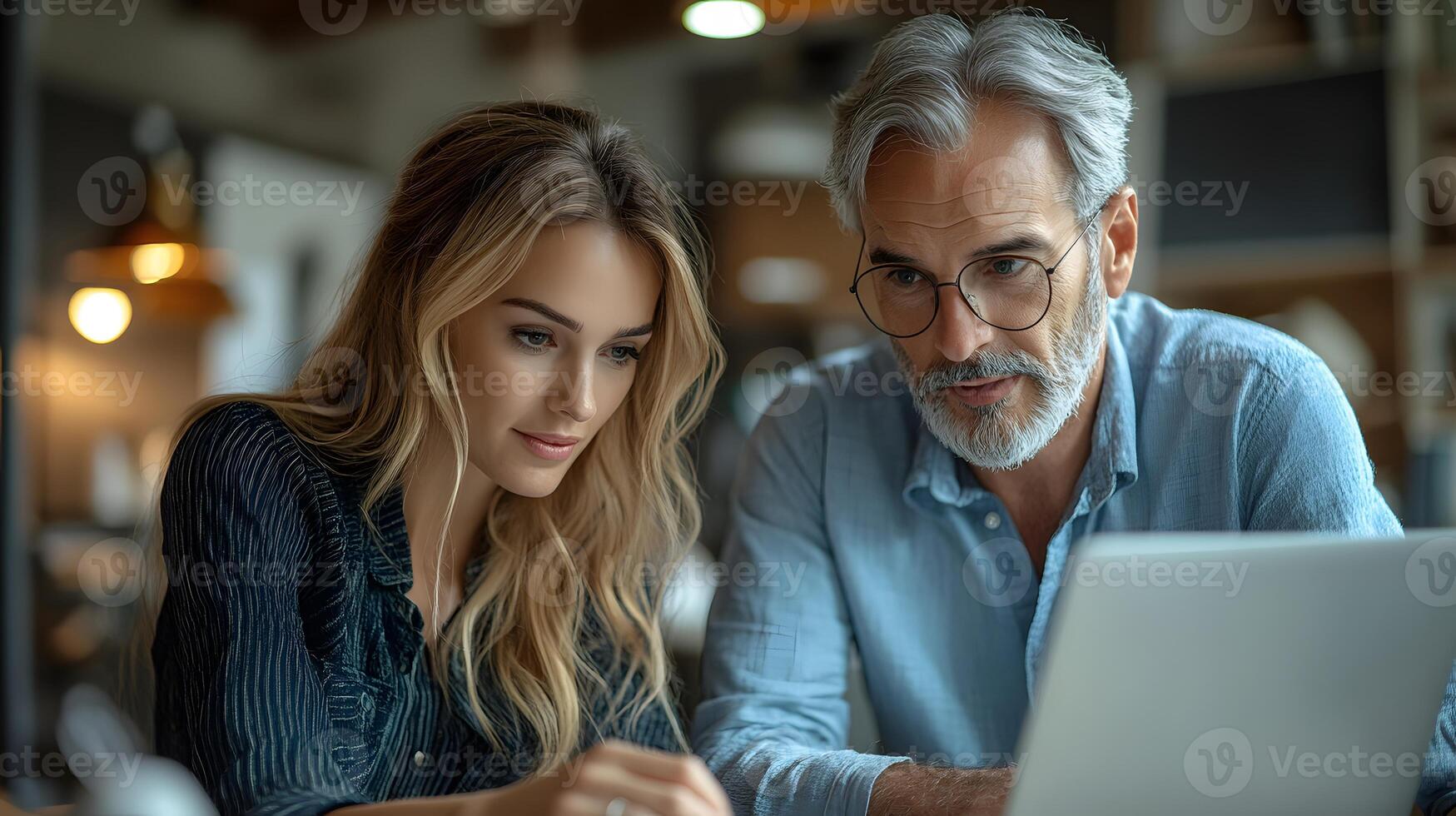 CEO and manager analyzing data on laptop, engaging conversation in professional office, photo
