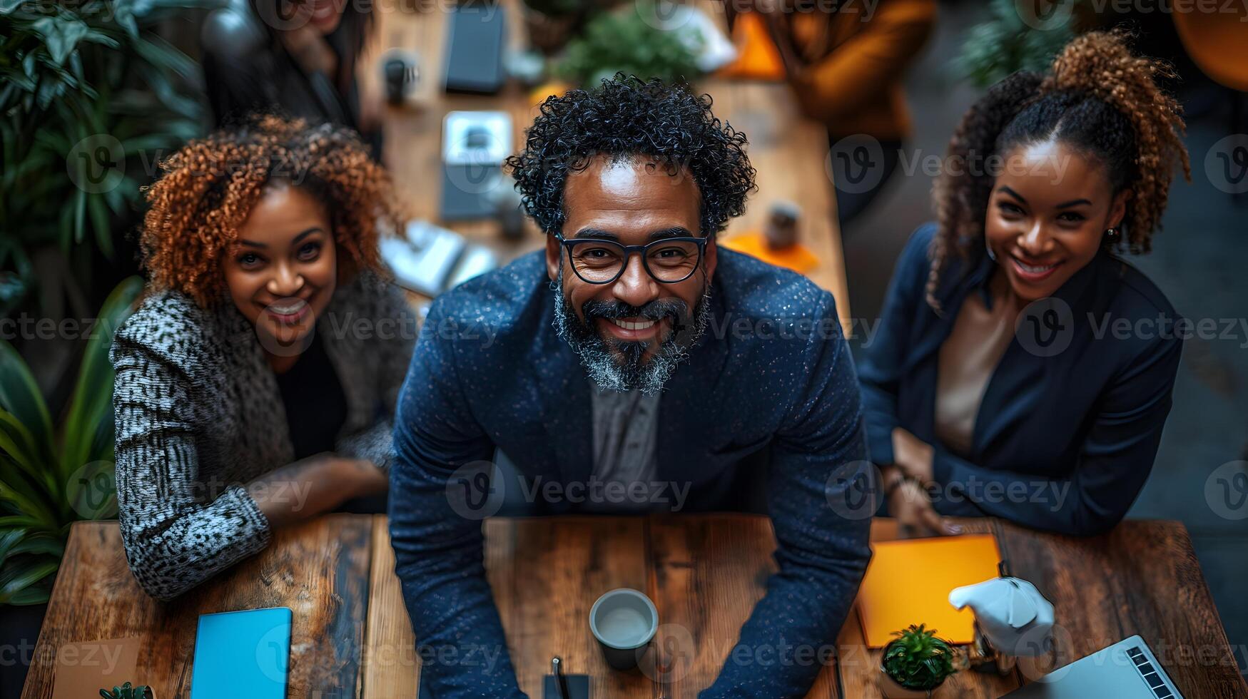 Diverse team gathered around a confident manager in a well-lit office, brainstorming ideas, wide angle, realistic visuals, with copy space photo