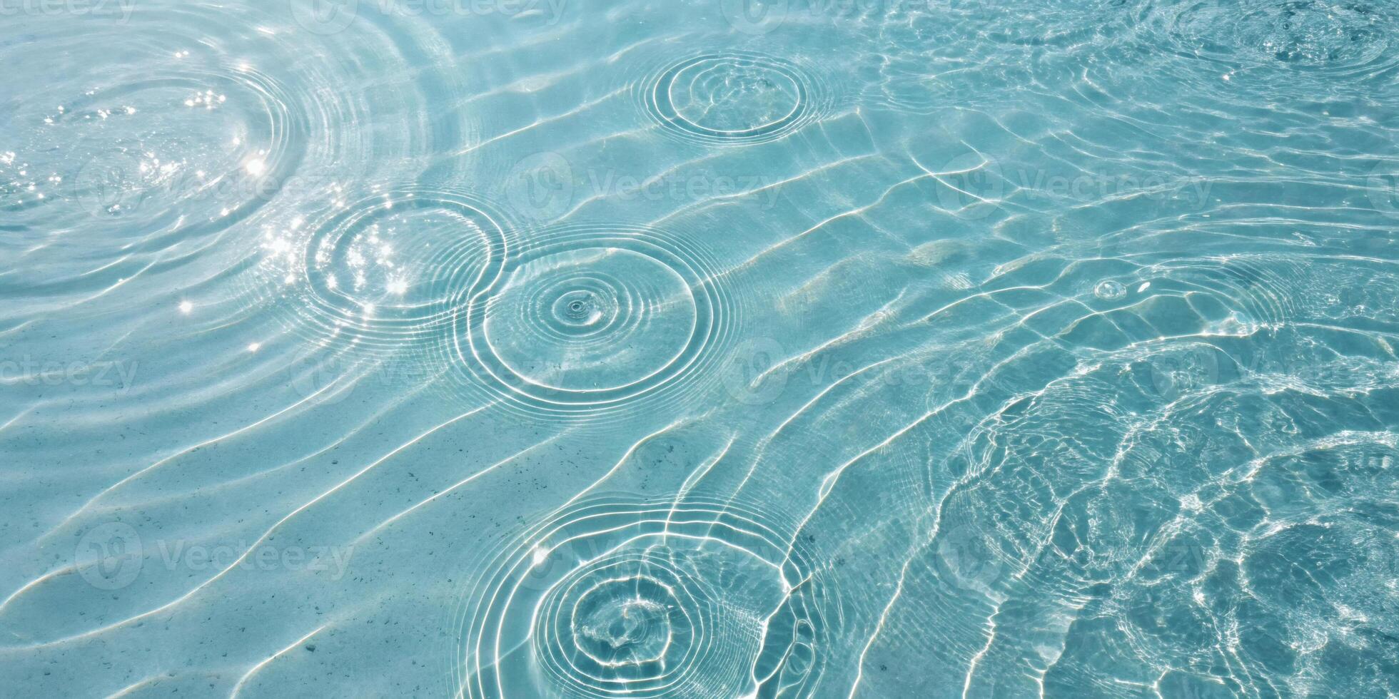 Water Surface with Circular Ripples and Sunlight Pattern photo