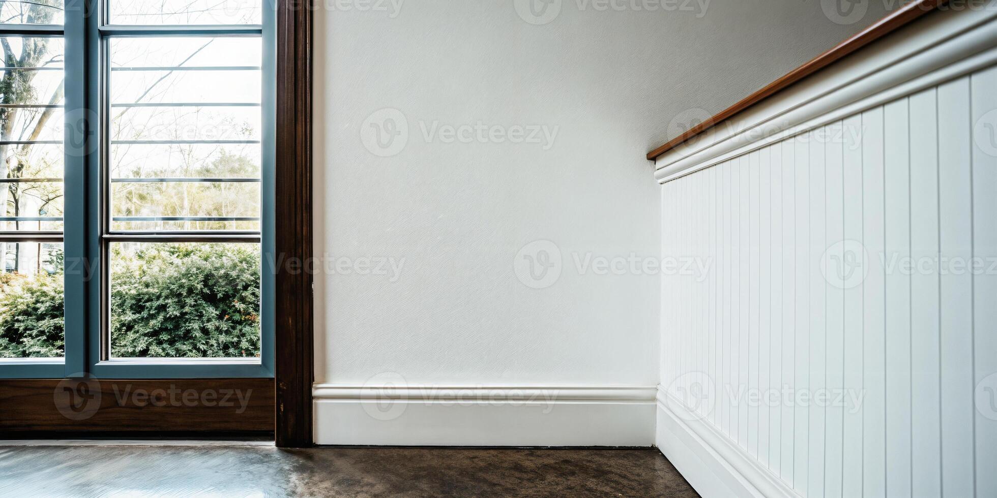 Minimalist Empty Room with Wainscoting and Large Window photo