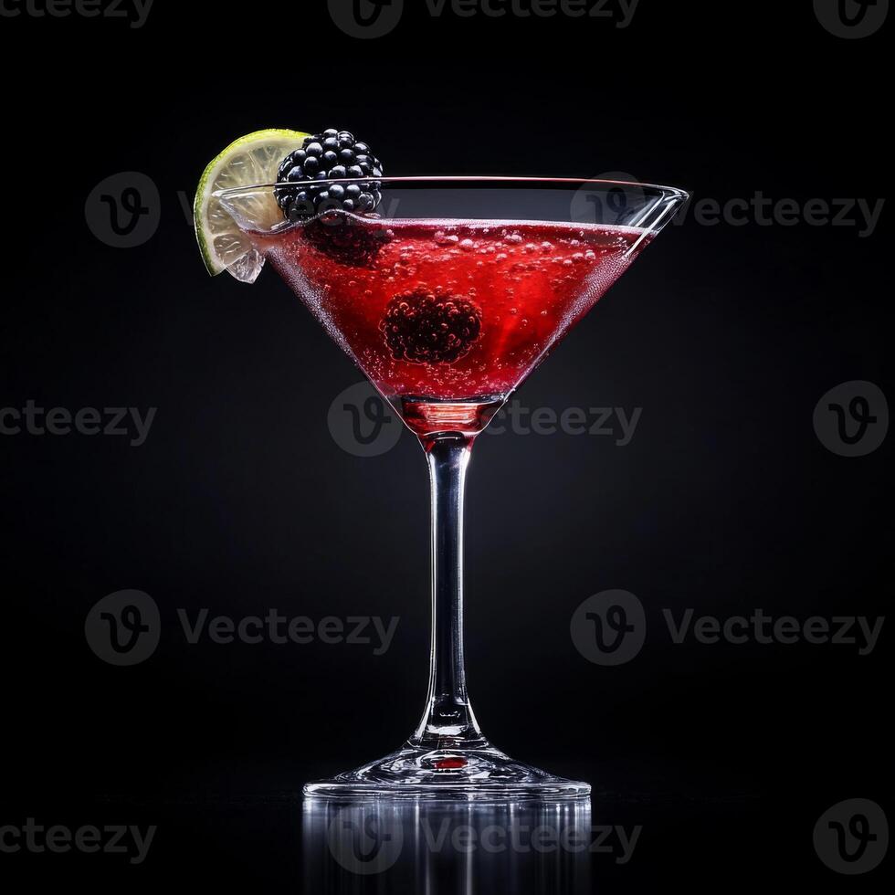 Elegant alcohol cocktail served in a martini glass against a dark background, showcasing a vibrant blend of colors and garnished with fresh blackberries and lime for a sophisticated bar experience photo