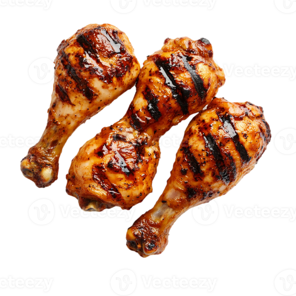 Grilled chicken drumsticks on a black surfaceisolated on transparent background png