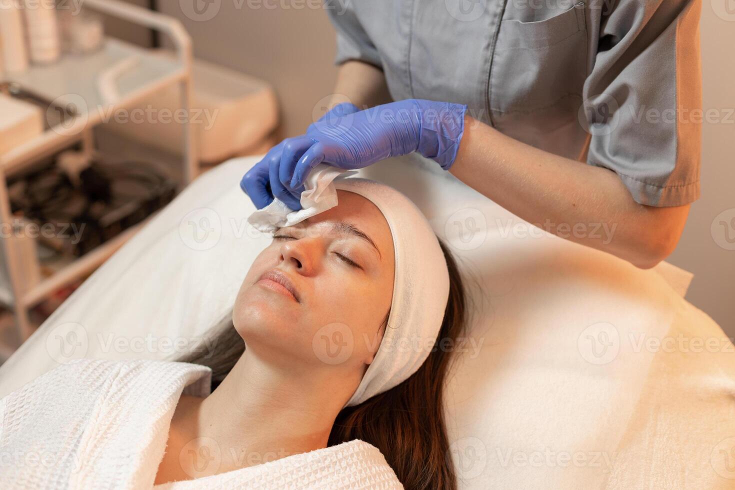 Skincare treatment with a professional in a spa during a soothing facial session photo