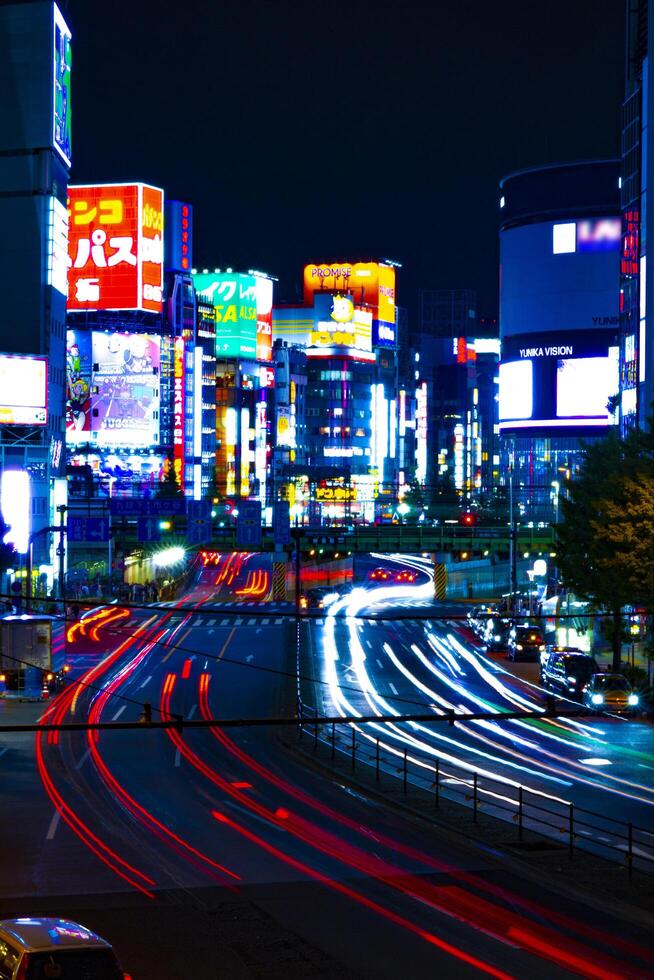 A timelapse of the street at the neon town in Shinjuku Tokyo photo