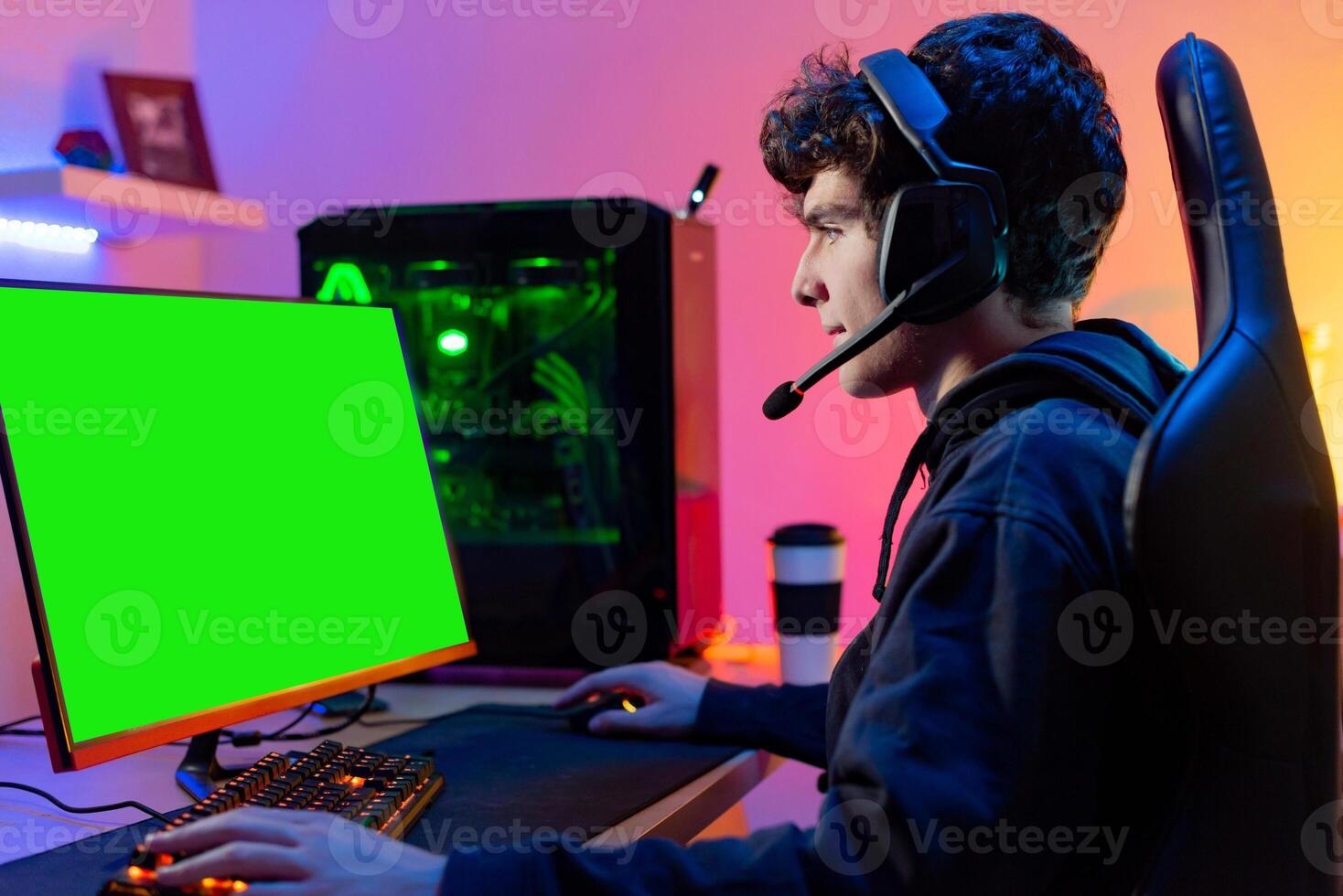 Young man using game streaming service on PC photo