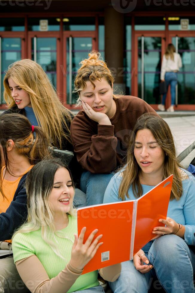 Group of young women studying and working on project photo