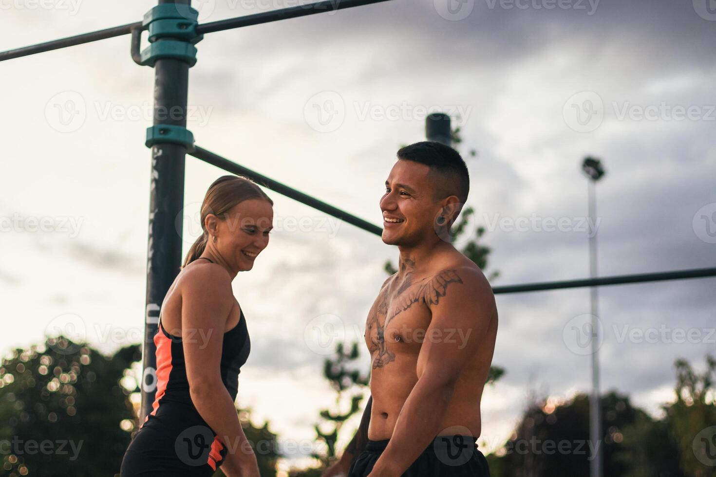 interracial couple training outdoors photo