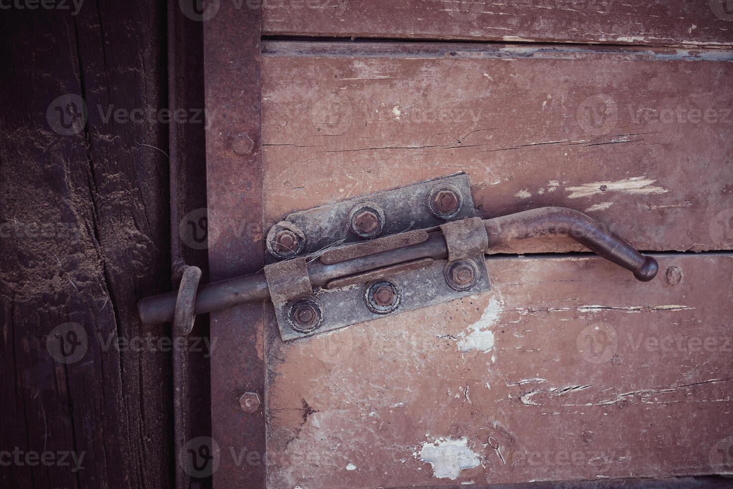 Old door of barn with latch photo