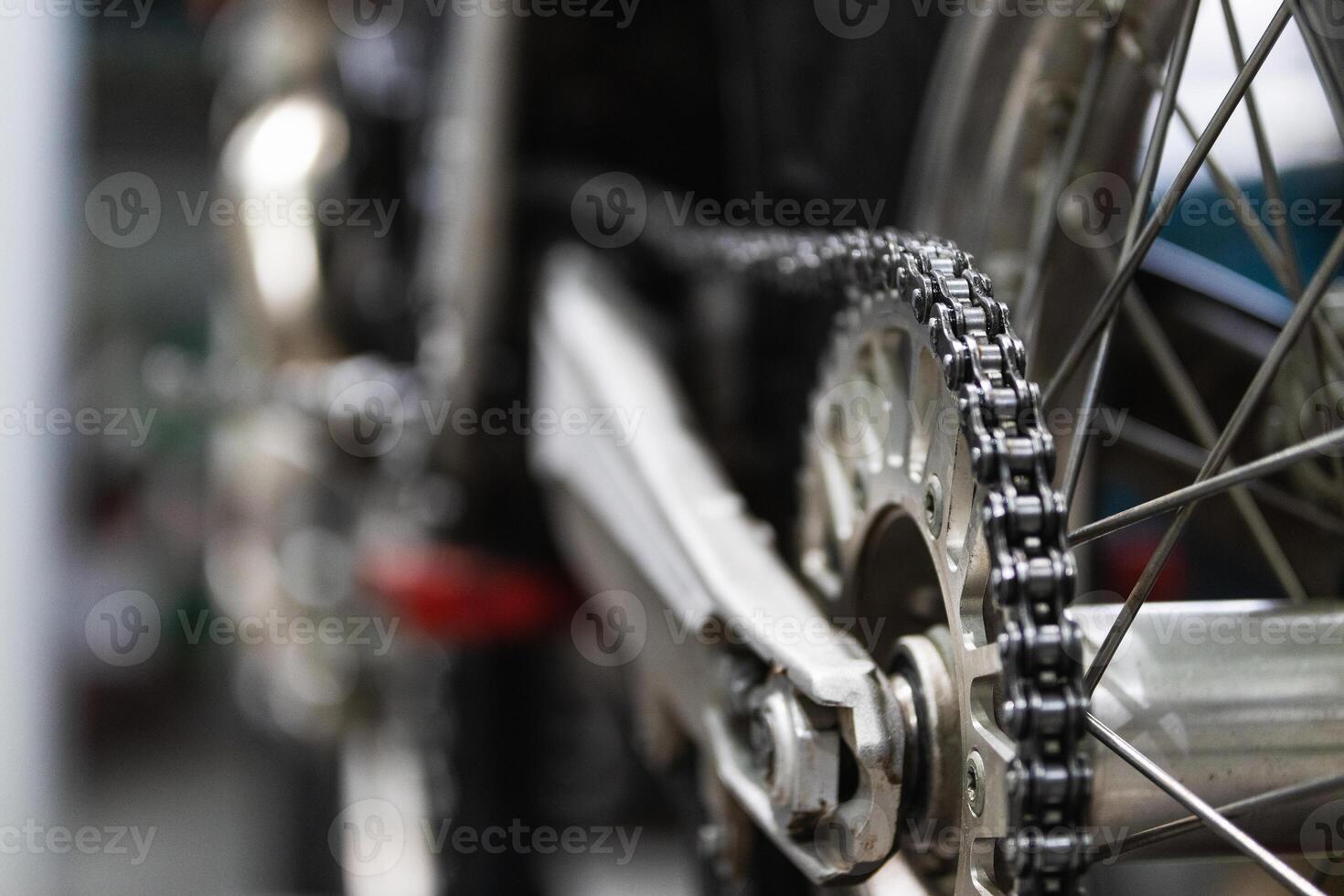 Detail of the chain of a motorcycle photo
