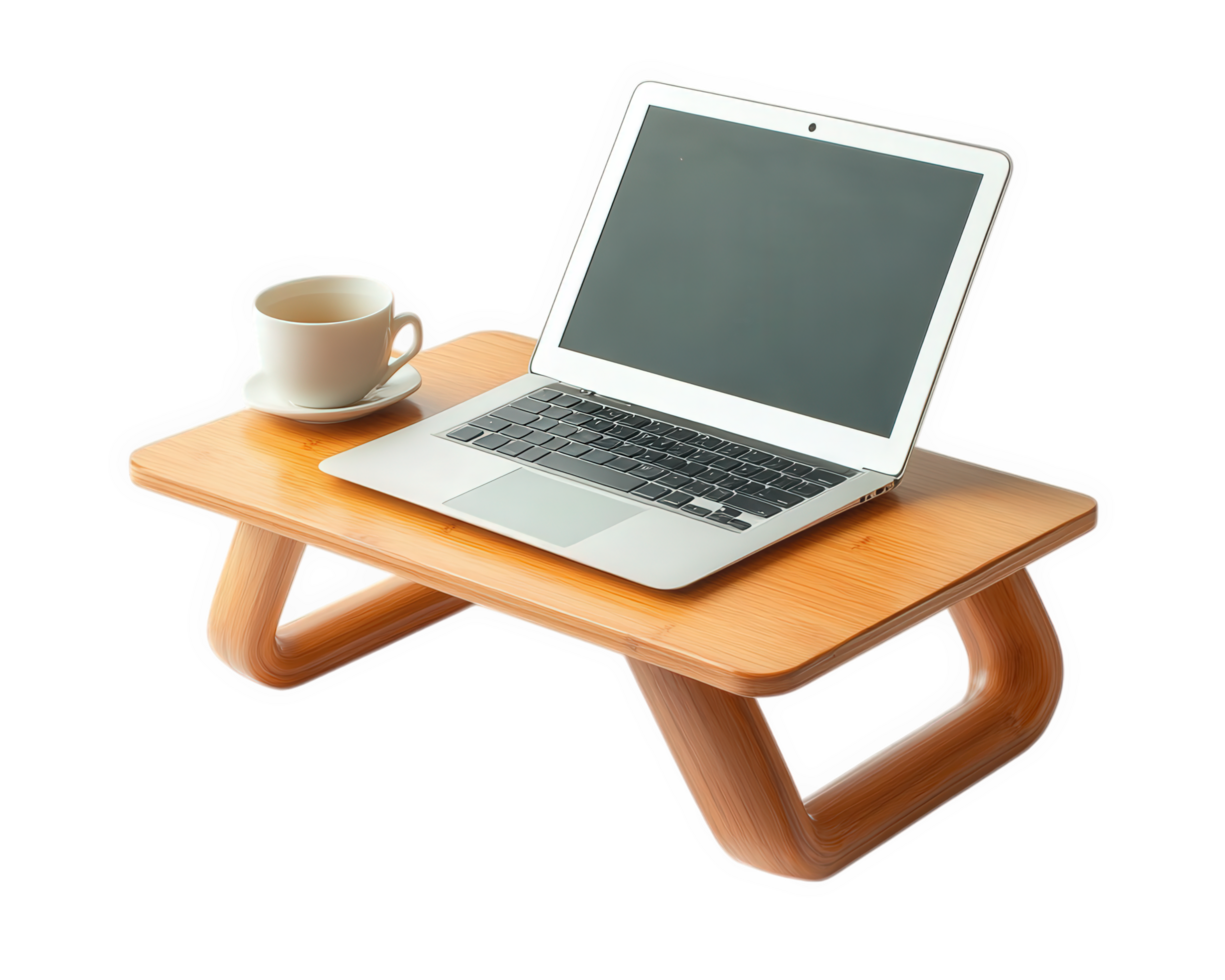 A laptop and cup of coffee sit on a wooden table png