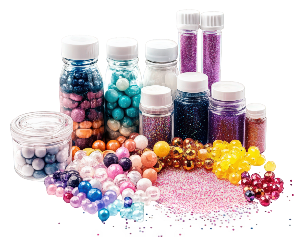 Colorful display of mixed media supplies including glitter, beads, and glue. Perfect for crafting and creative projects, these materials inspire imagination and artistic expression png