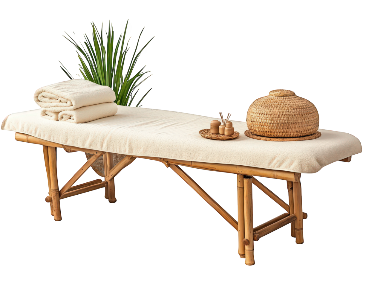A bamboo massage table with towels and a plant png