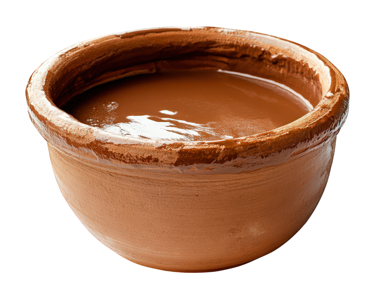 A brown clay pot with a brown liquid in it png