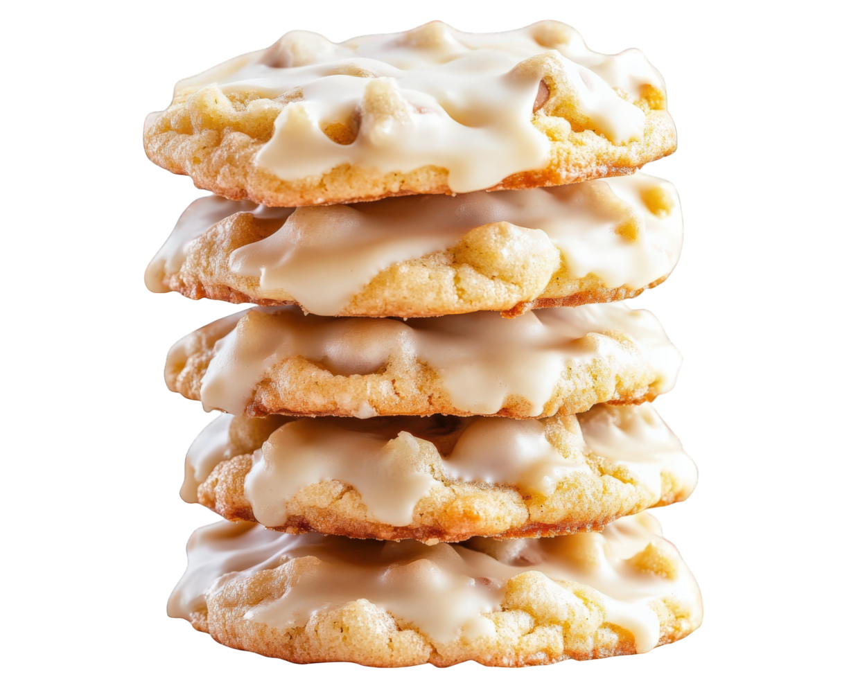 A stack of cookies with icing on top png