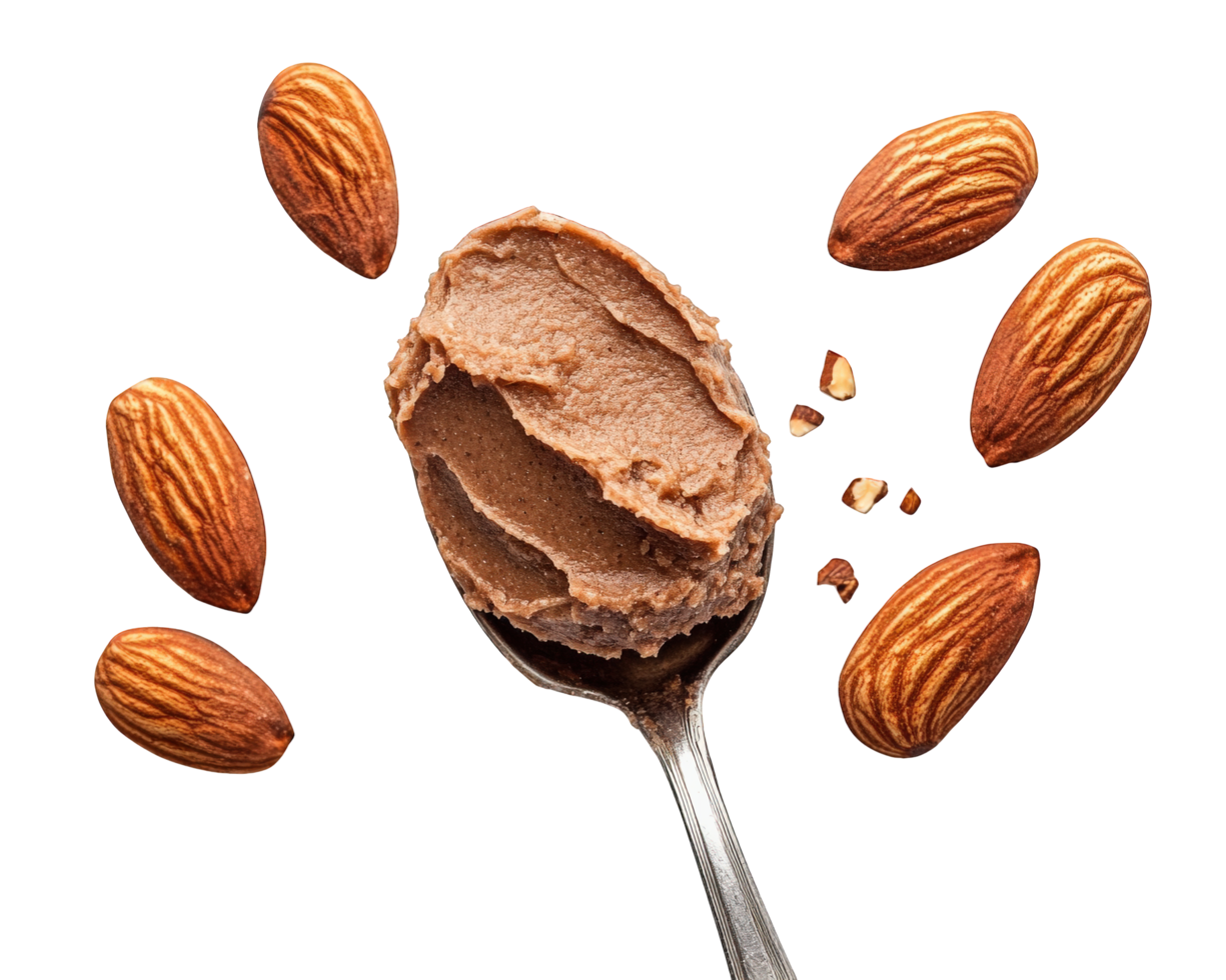 Almond butter spread on spoon with almonds on black background png