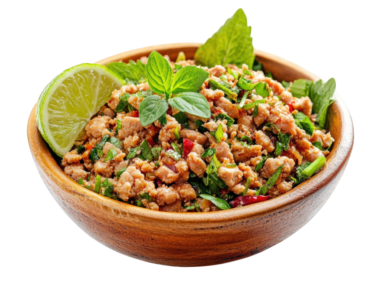 A bowl of meat and vegetables with a lime wedge png