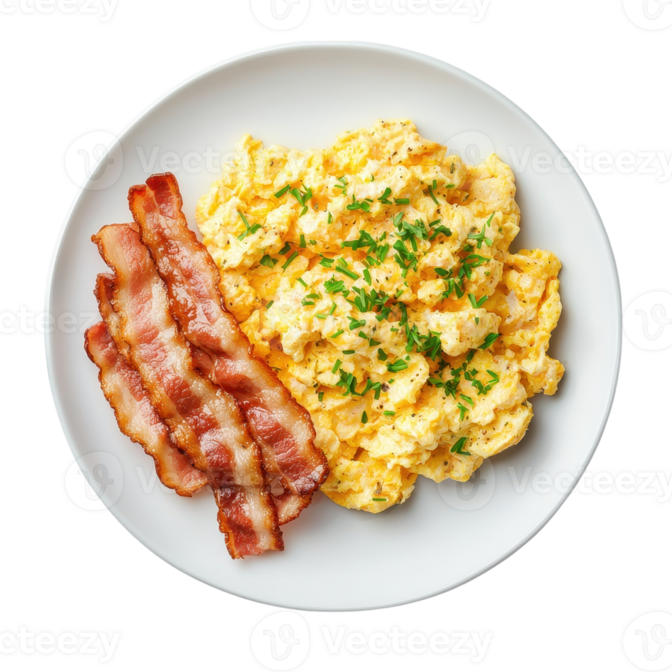 Overhead shot of scrambled eggs with bacon on a white plate against a transparent background. Concept of breakfast, brunch, and comfort food. png