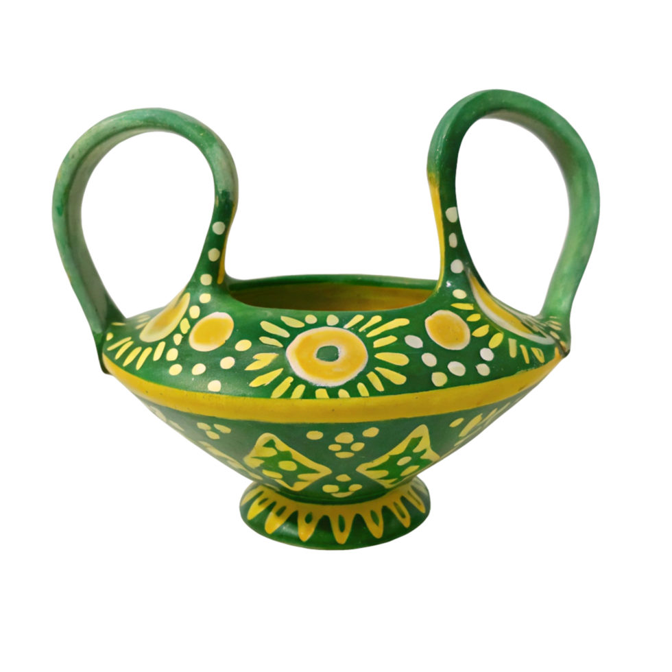 Handpainted green and yellow ceramic bowl with two handles, folk art pottery, decorative vase, traditional design, cultural artifact, unique handmade item png