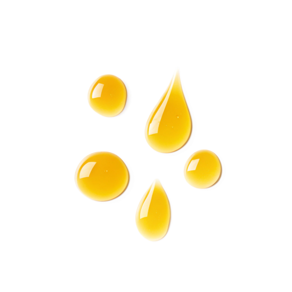 Golden Honey Drops Dripping Isolated on Black Background png