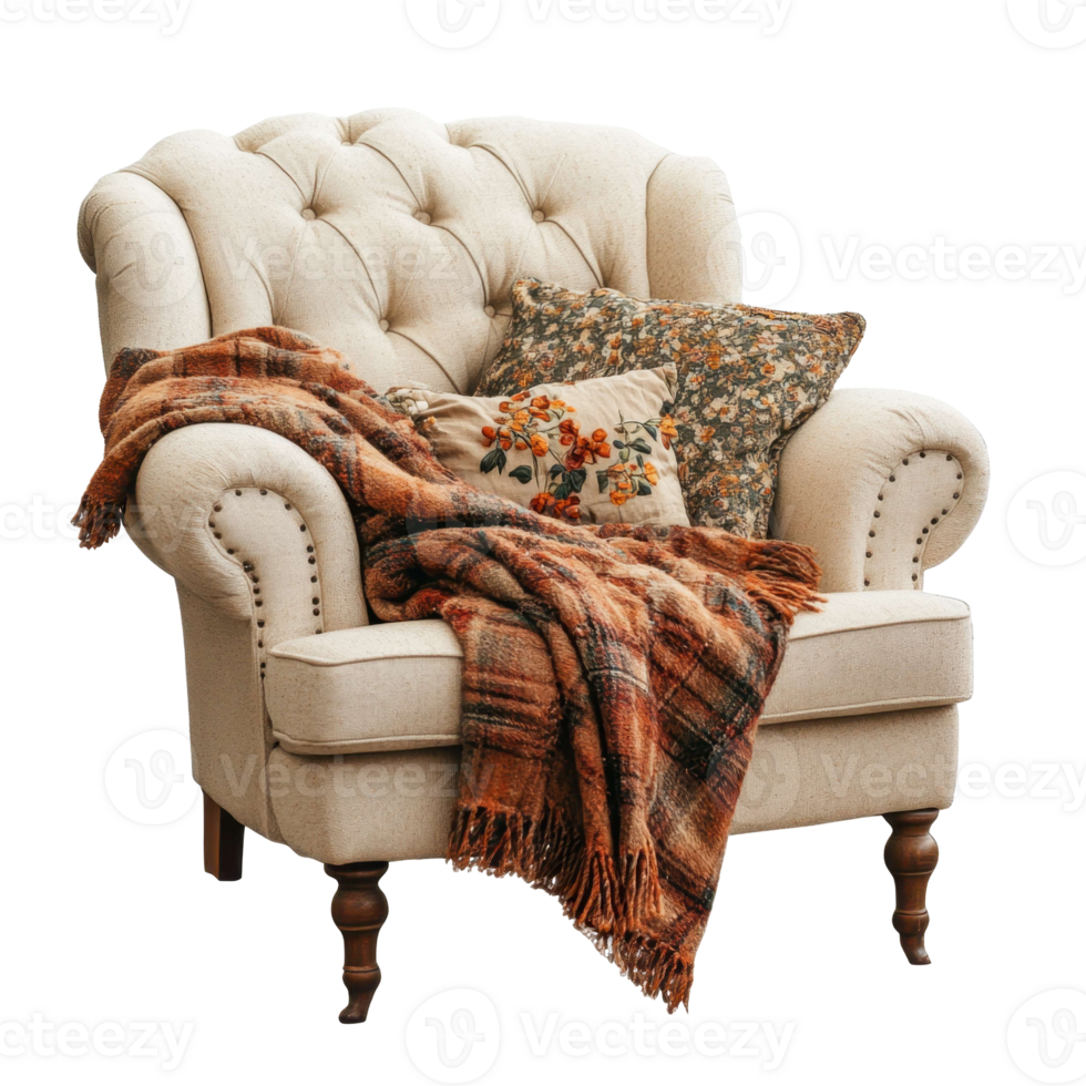 A chair with a blanket and pillows png
