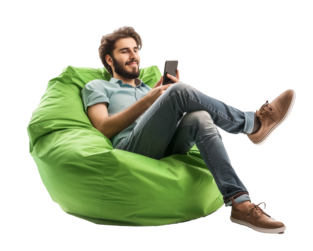man sitting on a bean bag chair with a cell phone png