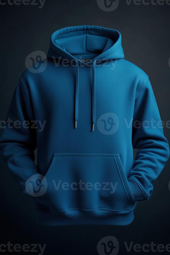 A plain blue color hoodie mockup against a dark background, featuring a front pocket and drawstrings. Sweatshirt with hood long sleeve for print. photo