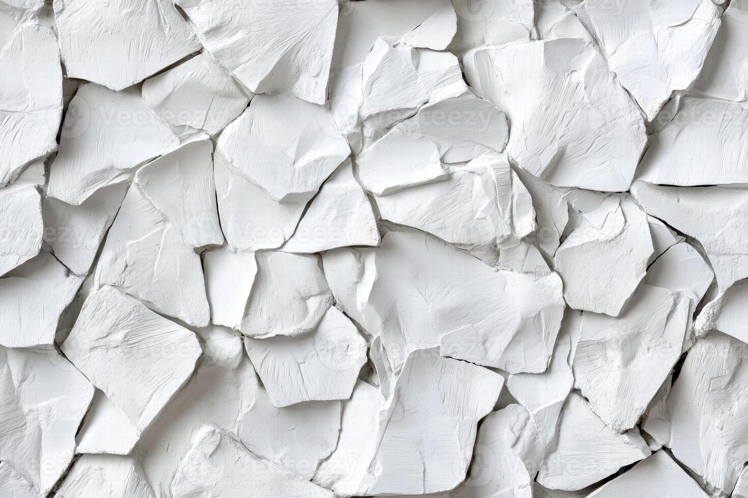 Seamless textured surface composed of irregular white pieces resembling cracked plaster or paint, creating a visually interesting pattern. photo