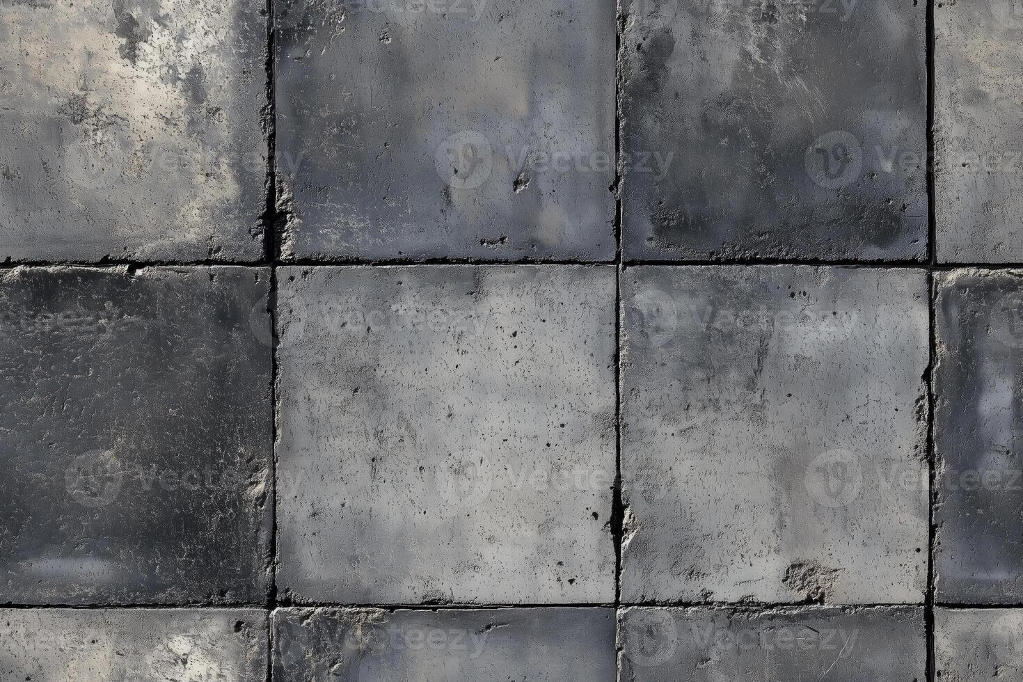 Seamless textured concrete surface featuring square tiles arranged in a grid pattern. The tiles have a weathered appearance with varying shades of gray and some rough edges. photo