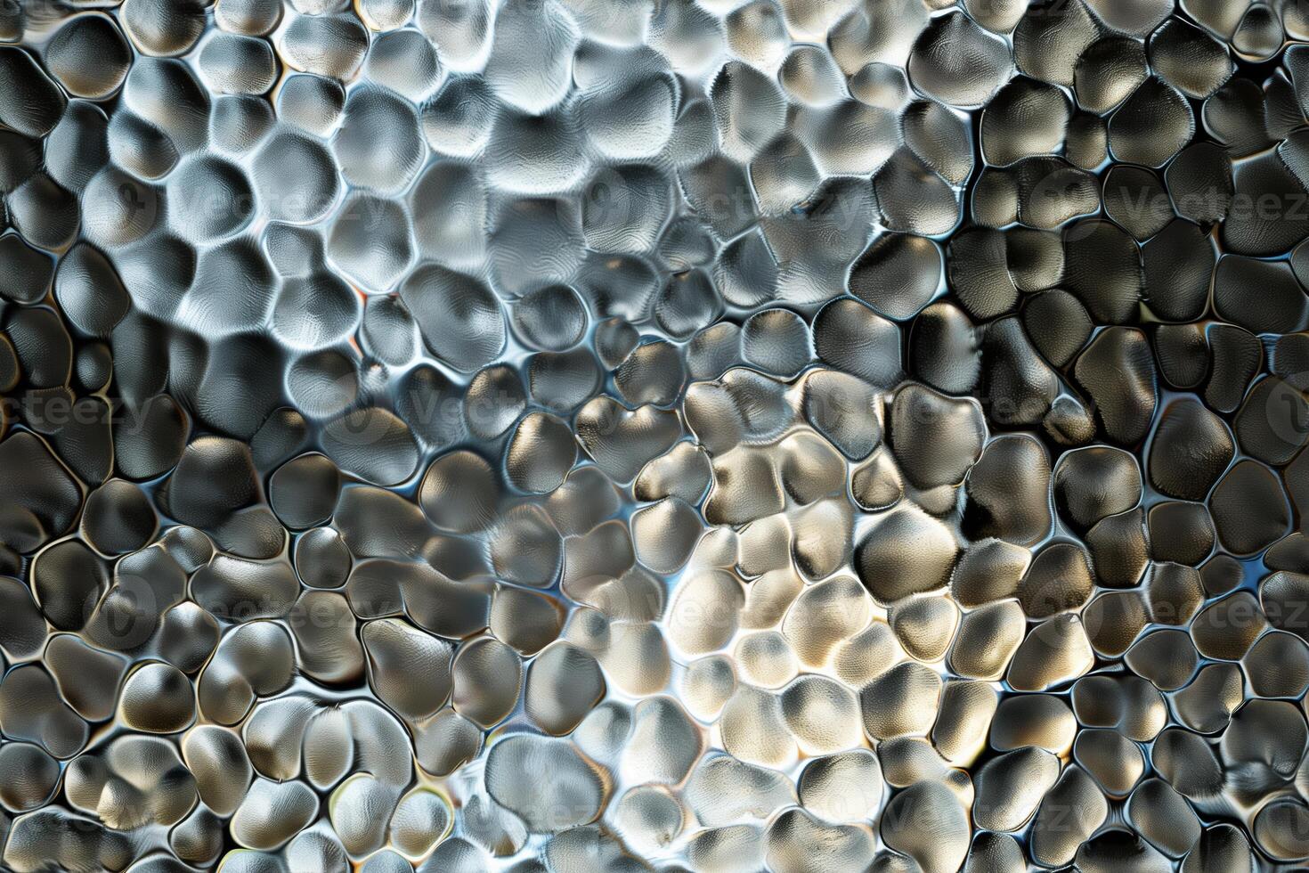 A close up of a glass surface with many different shapes photo