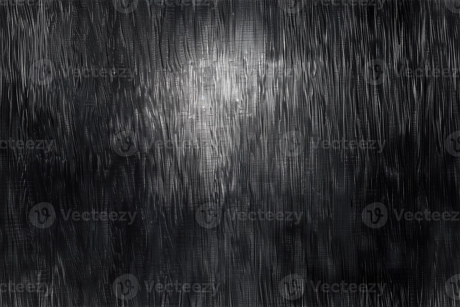 A black and white photo of a light shining through a window