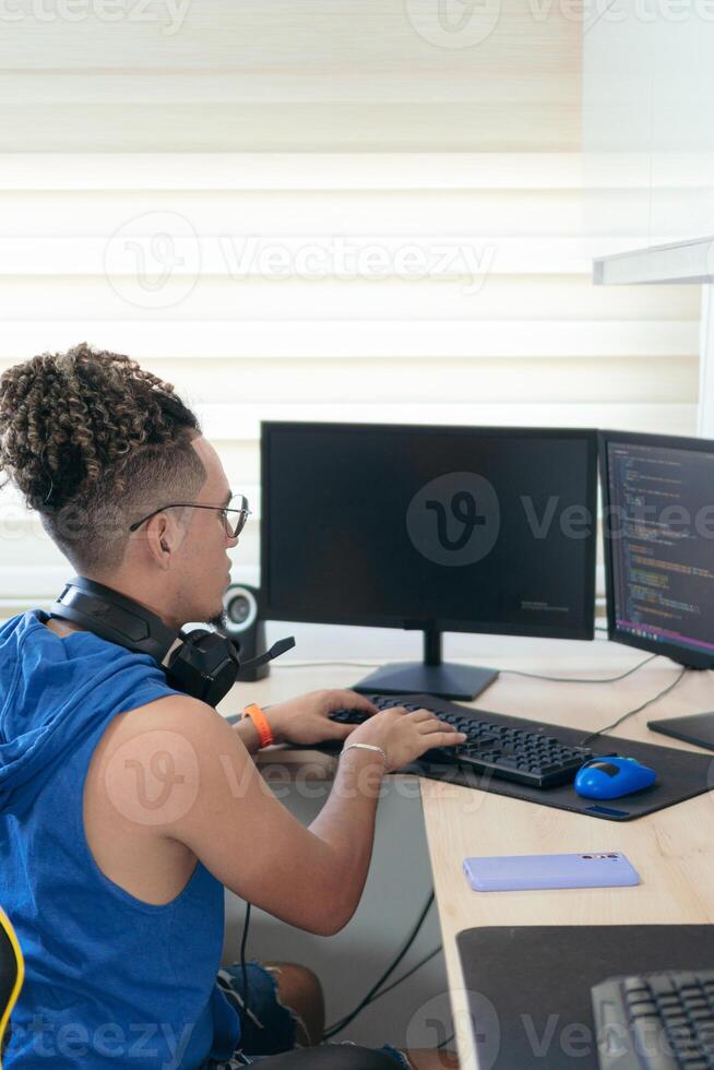 Computer Programmer Working In His Studio photo