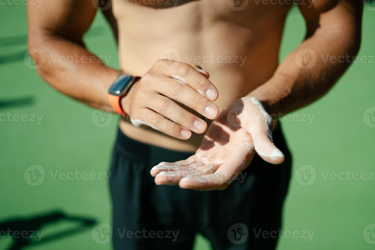 Close-up of a man's hands with magnesium photo