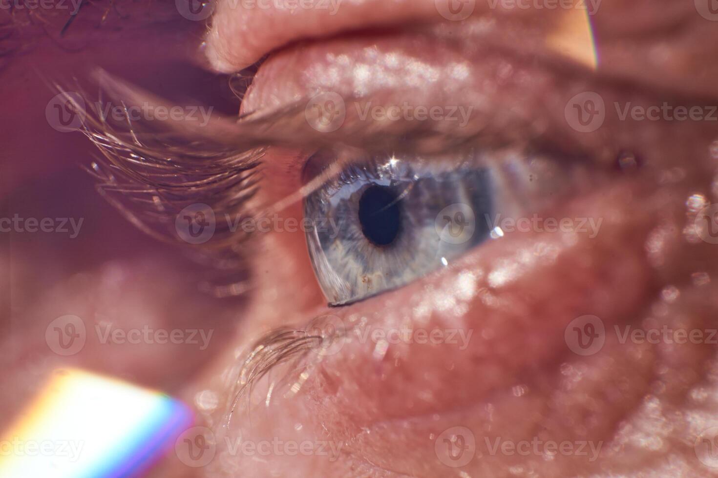 Closeup on eye of crop person photo